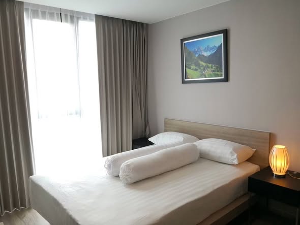 bedroom of The TEAK Sukhumvit 39