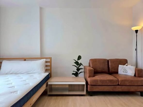 bedroom and living room of The Tree Interchange