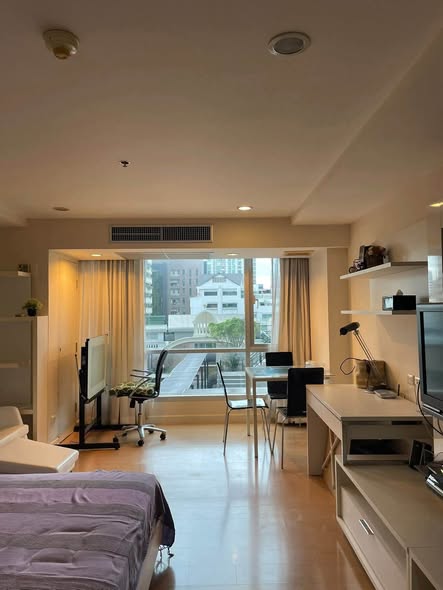 bedroom of The Trendy Condominium