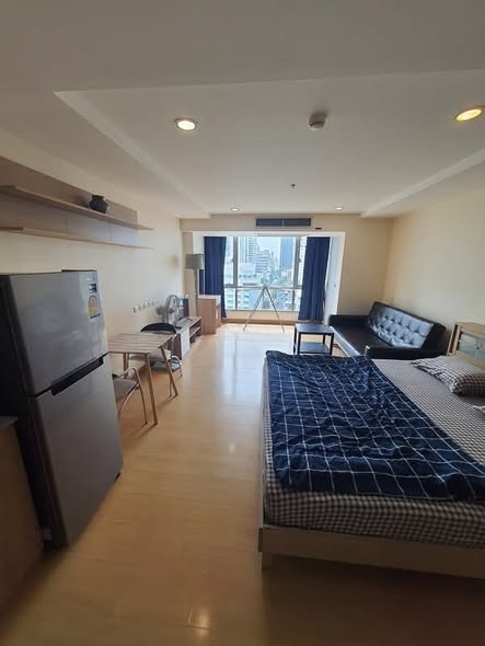bedroom of The Trendy Condominium