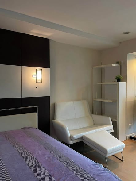 bedroom of The Trendy Condominium