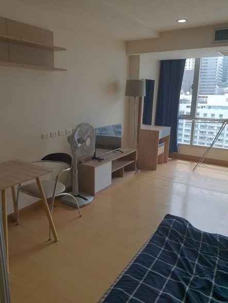 bedroom of The Trendy Condominium
