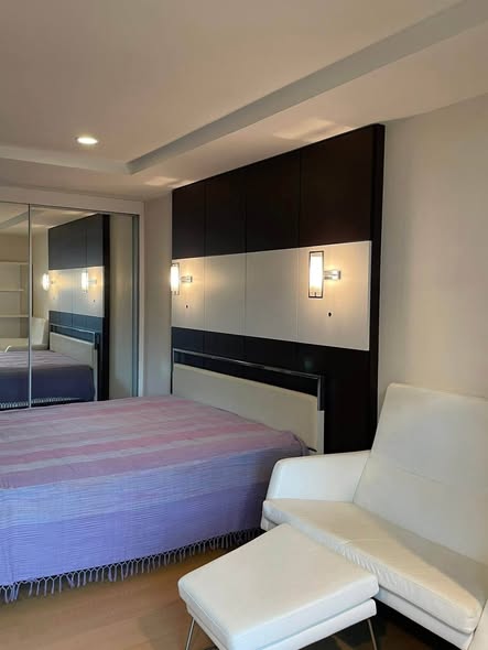 bedroom of The Trendy Condominium