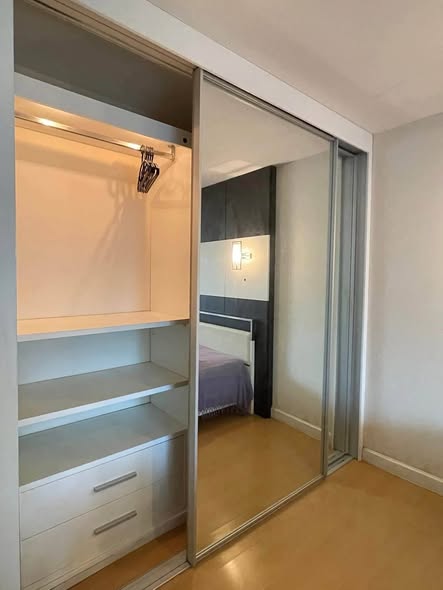 bedroom and room interior of The Trendy Condominium