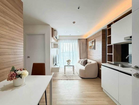 bedroom and living room of The Trust Condo Ngamwongwan