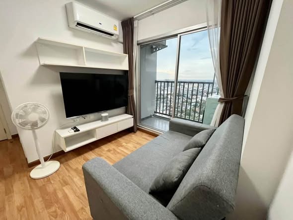 bedroom and living room of The Trust Condo Ngamwongwan