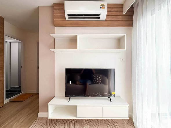 living room and bedroom of The Trust Condo Ngamwongwan