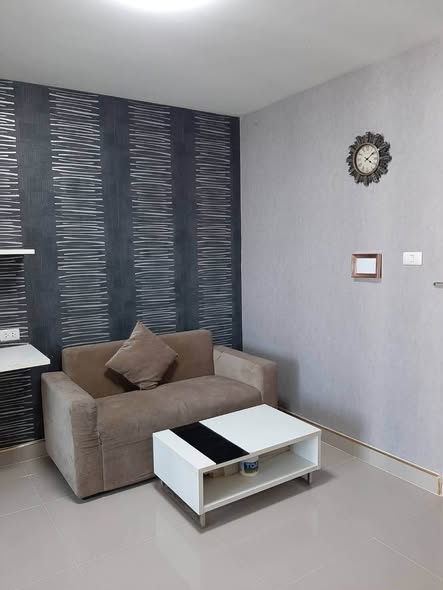 bedroom and living room of The Trust Residence