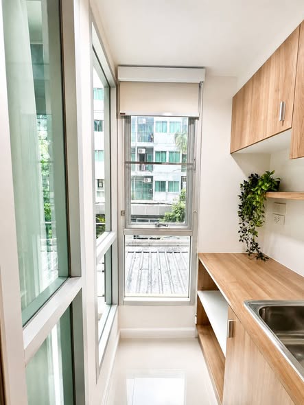 room interior and bathroom of The Urbano Condo