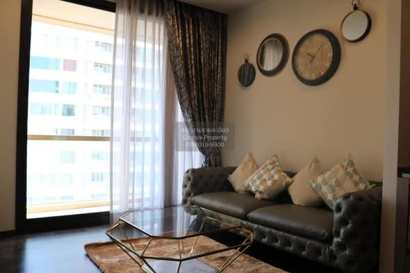 living room and bedroom of THE XXXIX