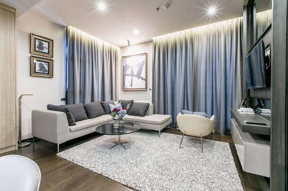 living room and bedroom and bathroom of THE XXXIX