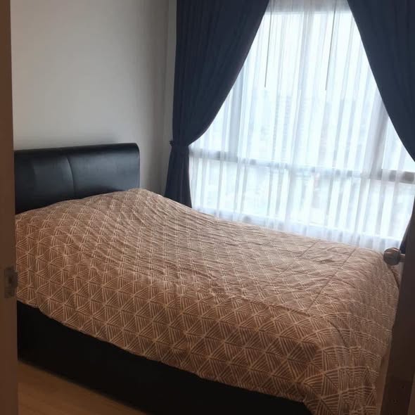 bedroom of Thru Thong Lor