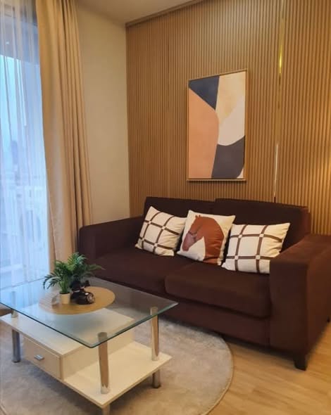 bedroom and living room of Thru Thong Lor