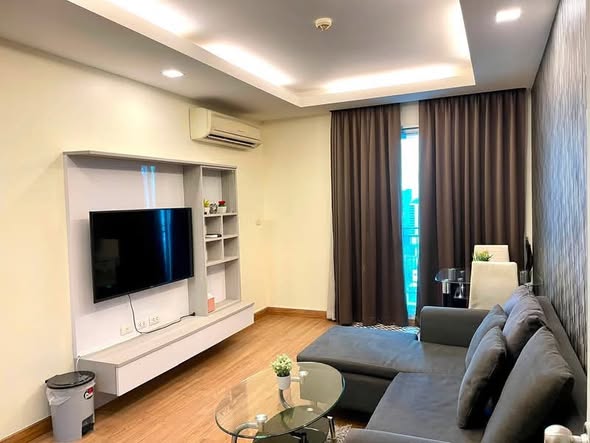 bedroom and living room of Thru Thong Lor