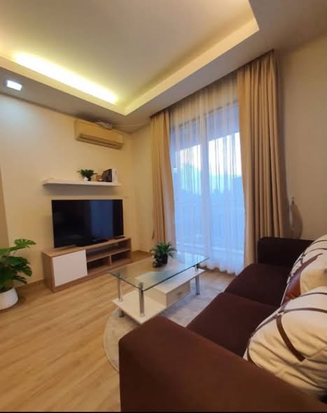 living room and bedroom of Thru Thong Lor