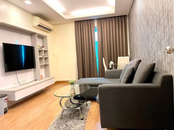 living room and bedroom of Thru Thong Lor
