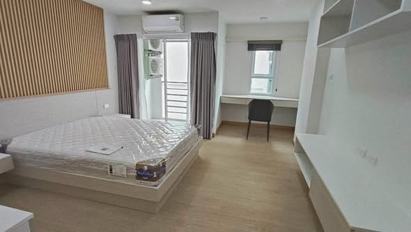 bedroom of Tidy Deluxe Condominium