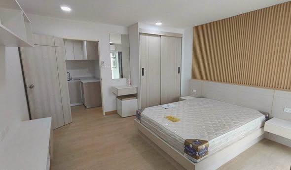 bedroom of Tidy Deluxe Condominium
