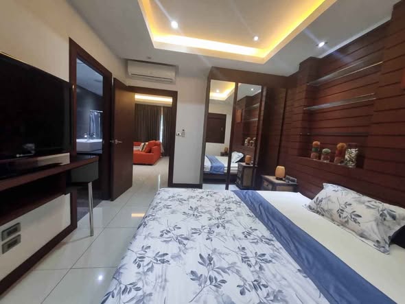 bedroom of Tudor Court Condominium