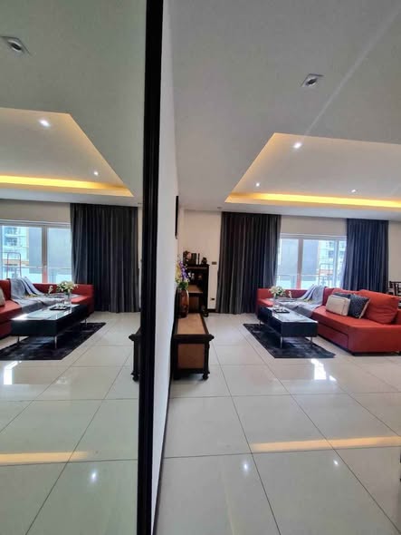 living room of Tudor Court Condominium