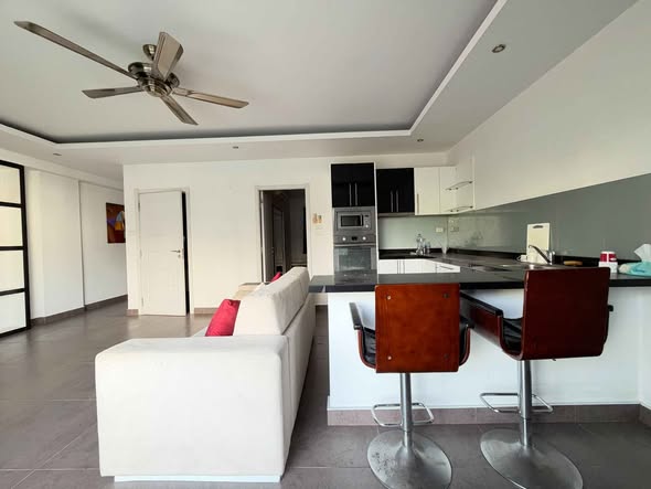 living room and room interior of Tudor Court Condominium