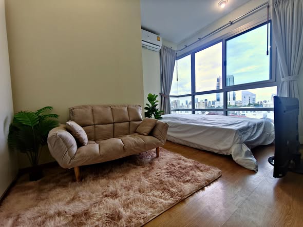 living room and bedroom of U-Delight Jatujak Station condo.