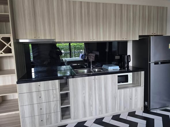 room interior and kitchen of Venetian Signature Condo Resort Pattaya