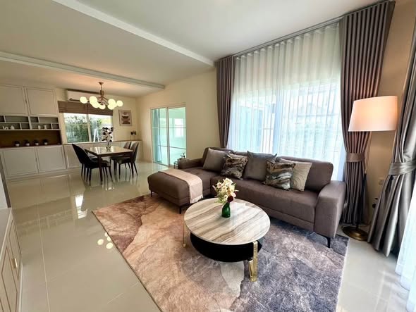 living room and bedroom of Villaggio 3 Srinakarin-Bangna