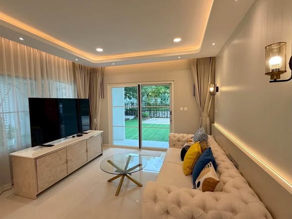 living room and bedroom of Villaggio 3 Srinakarin-Bangna