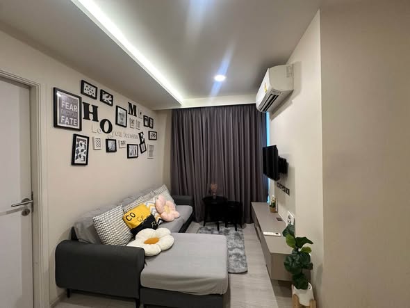 bedroom and living room of VTARA36 Condominium