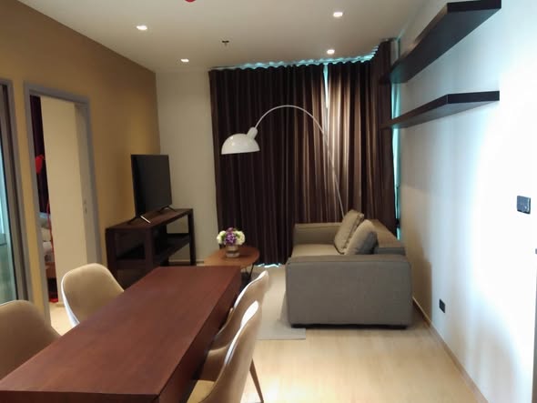 bedroom and living room of Whizdom Station Ratchada-ThaPra