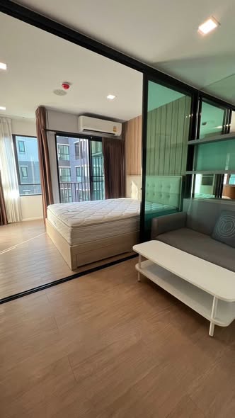 bedroom and living room and room interior of Wynn Condo Chokchai 4