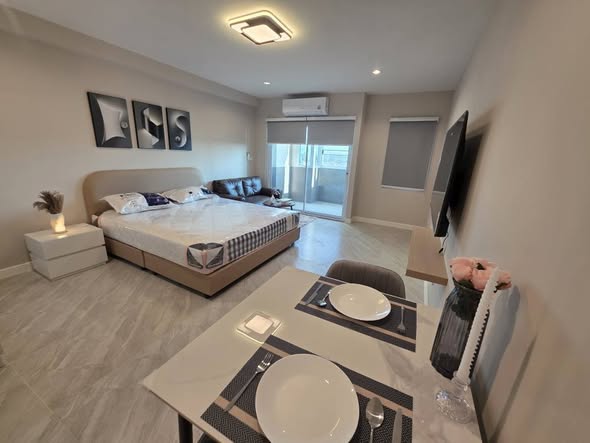 bedroom of 103 Central condominium