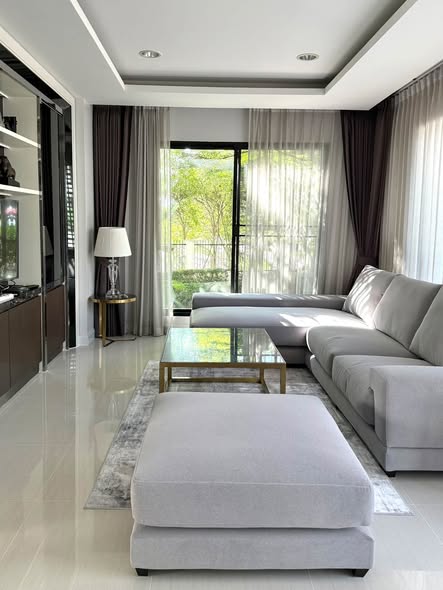 bedroom and living room of 30 Post & Pay