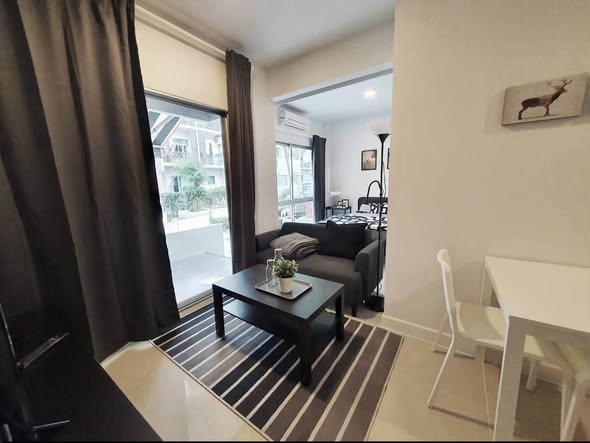 living room and bedroom of A Space ME Sukhumvit 77