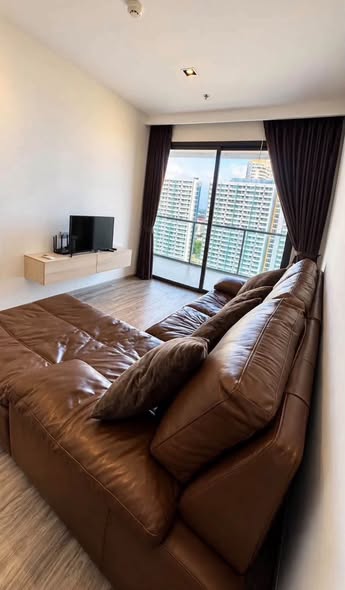 living room and bedroom of AERAS Beachfront Condominium Jomtien Pattaya