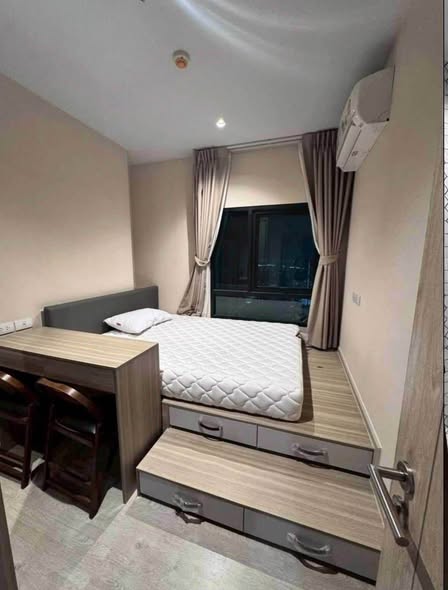 bedroom of Altitude Unicorn Sathorn