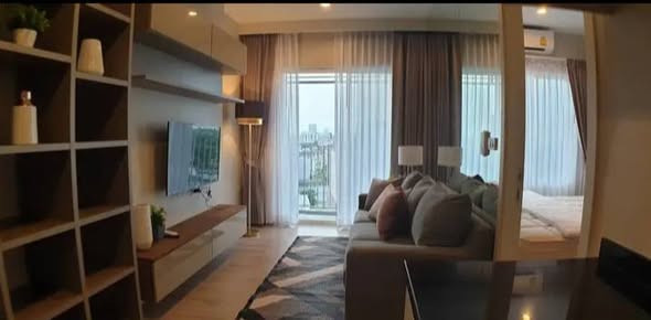 bedroom and living room of Amber Condominium By Eastern Star