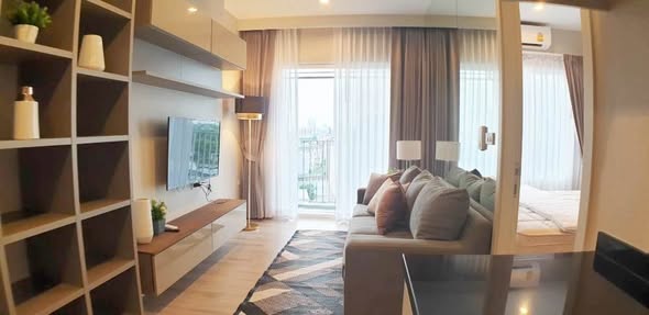 living room and bedroom of Amber Condominium By Eastern Star