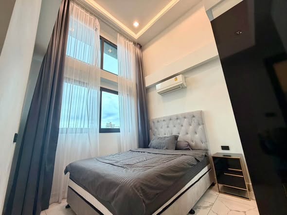 bedroom of Arcadia Millennium Tower