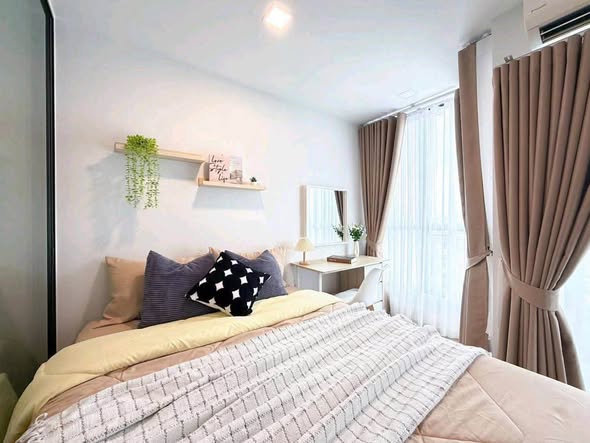 bedroom of Atmoz รัชดา-ห้วยขวาง คอนโด