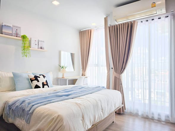 bedroom of Atmoz รัชดา-ห้วยขวาง คอนโด