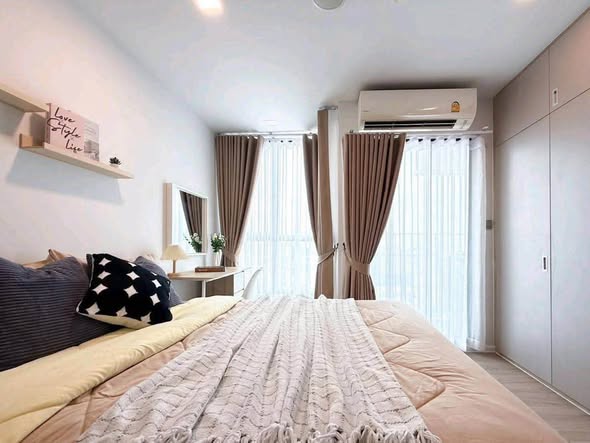 bedroom of Atmoz รัชดา-ห้วยขวาง คอนโด