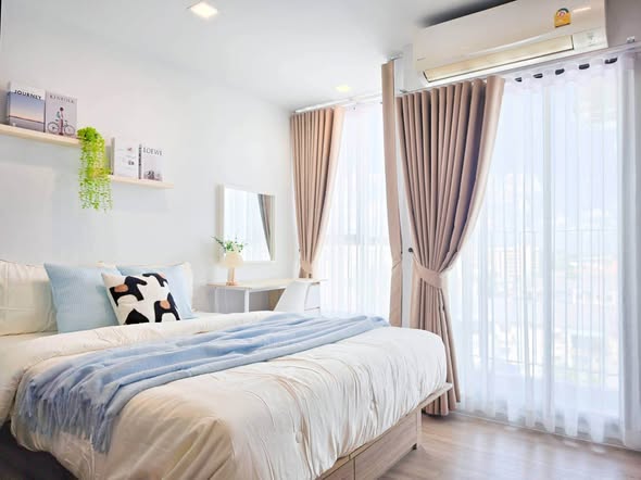 bedroom of Atmoz รัชดา-ห้วยขวาง คอนโด