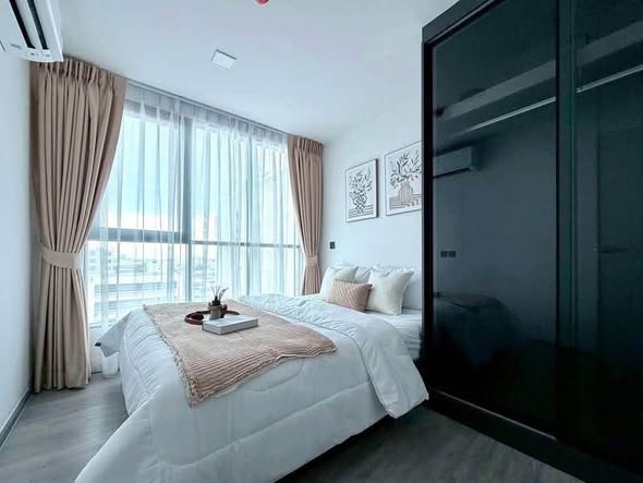 bedroom and room interior of Atmoz Palacio Ladprao Wanghin | แอทโมซ พาลาซิโอ ลาดพร้าว วังหิน