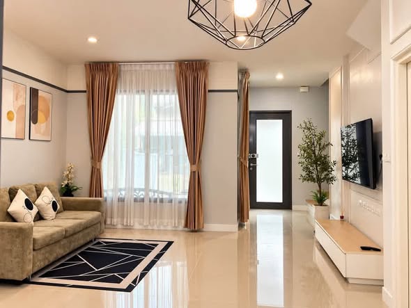 bedroom and living room of บ้านรีโนเวท