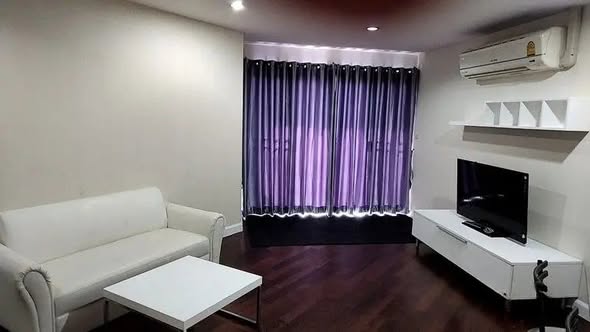 living room and bedroom of Belle Park Residence