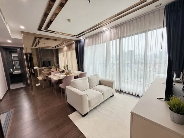 bedroom and living room of C Ekkamai Condominium