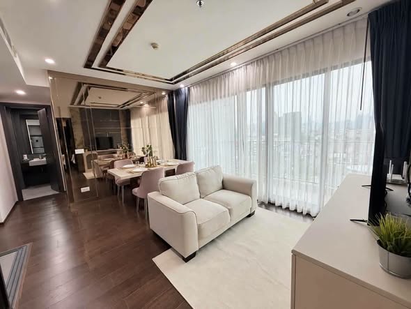 bedroom and living room of C Ekkamai Condominium
