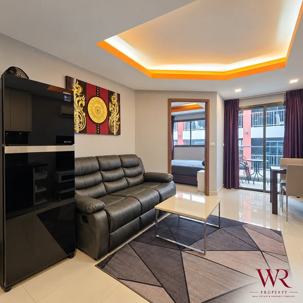 bedroom and living room of C-View Residence